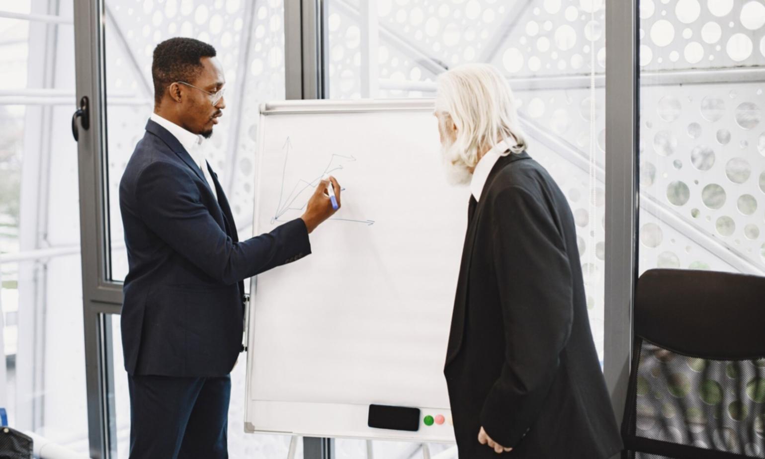 Financial planning consultation workspace with documents and calculator